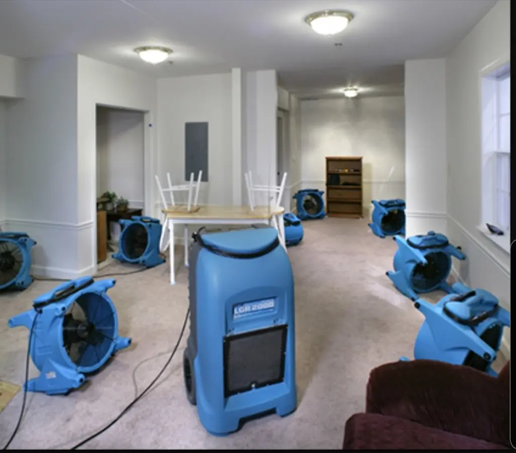 Air movers and dehumidifier setup for Water Extraction & Removal in Hays